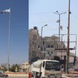 هل استبدلت هيئة تحرير الشام راياتها في إدلب بـ "علم الثورة السورية"؟