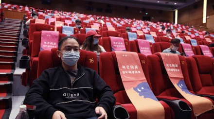 Has this Chinese man spoiled Valentine's Day for lovers by booking all two seats that next to each other at the cinema?