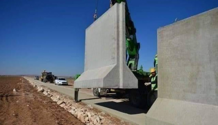 What is the truth behind the wall that is being built by Turkey to isolate Afrin?