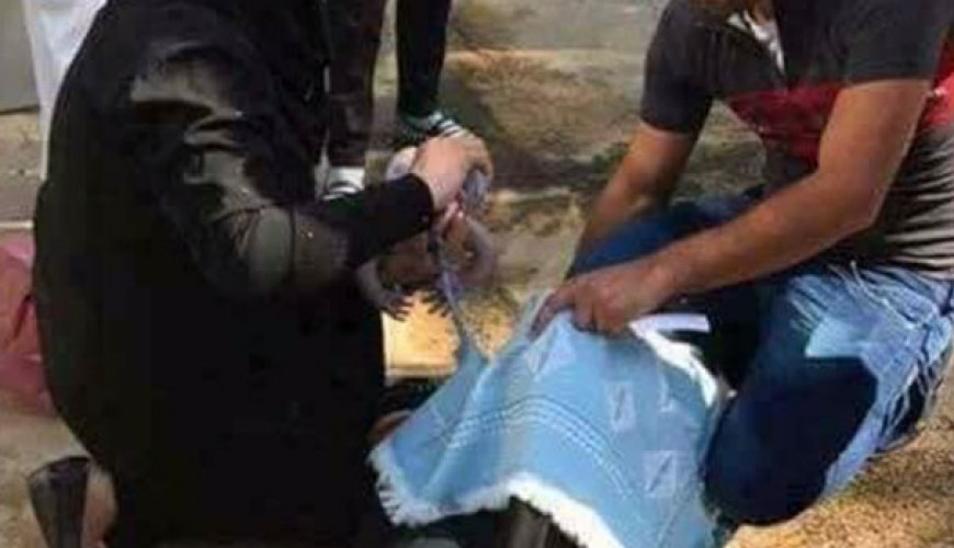 Pregnant Syrian woman delivering her baby in front of a hospital in Lebanon happened in 2017 not recently