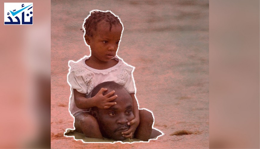 صورة الرجل الذي يحمل طفلة وسط الفيضانات ليست في السودان